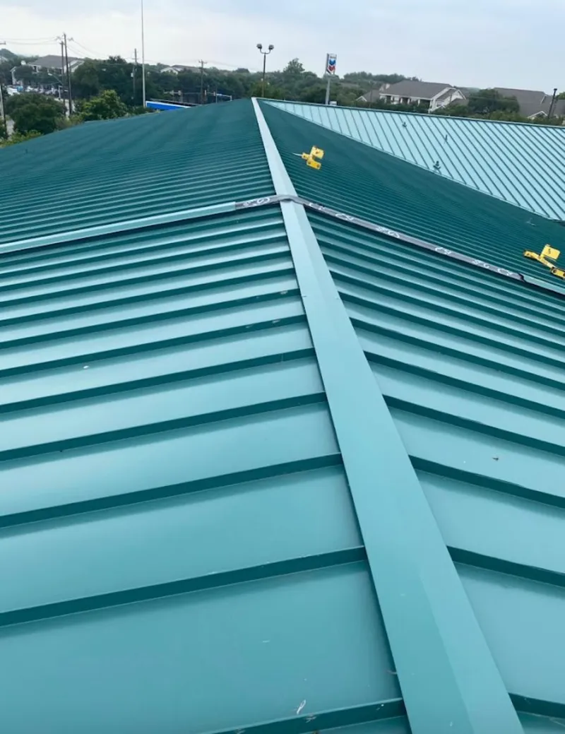 Green commercial metal roof ridge and valley for Metal Roof Repair in Benton Harbor